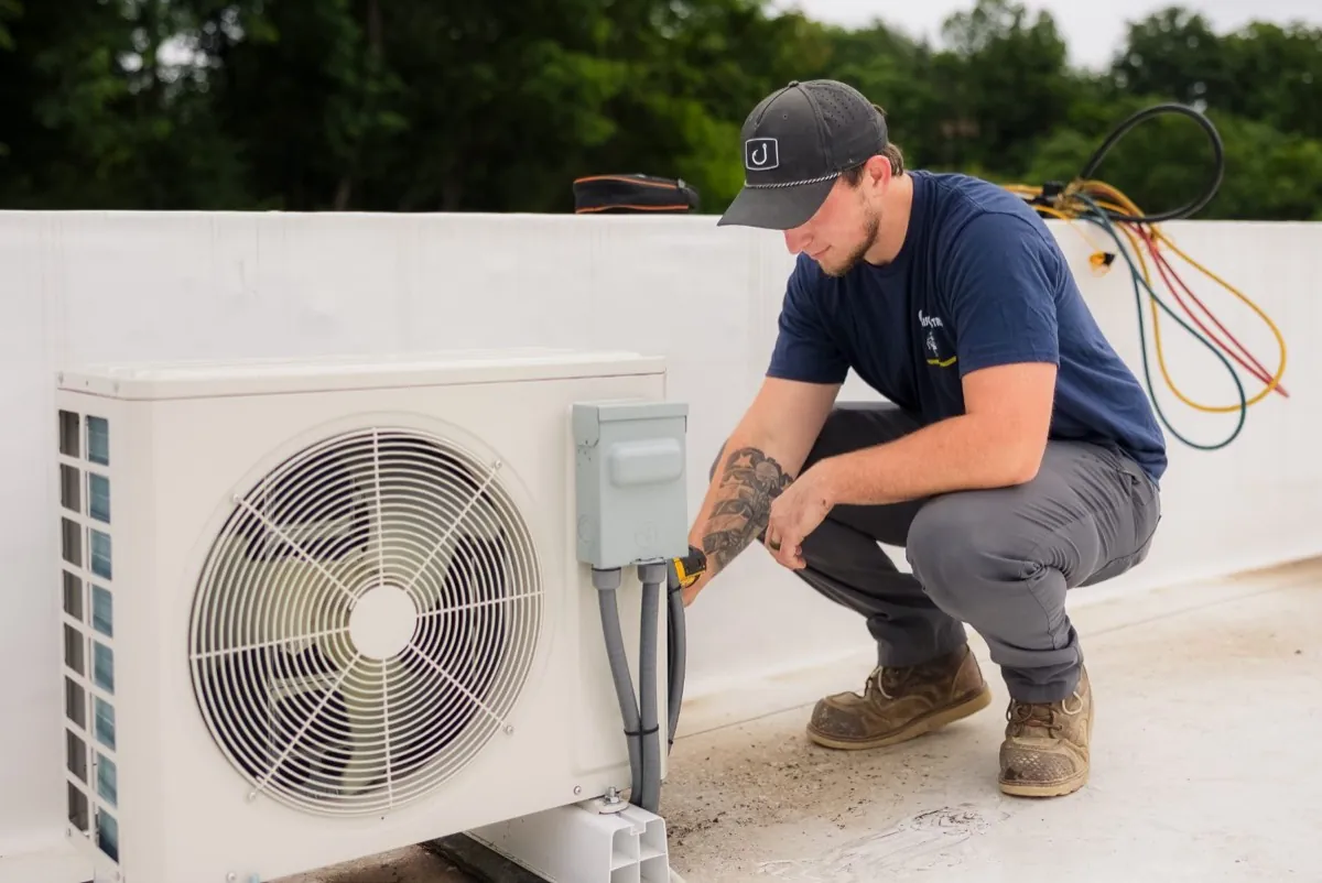 Callison technician wiring an outdoor electrical disconnect in Staunton, Virginia