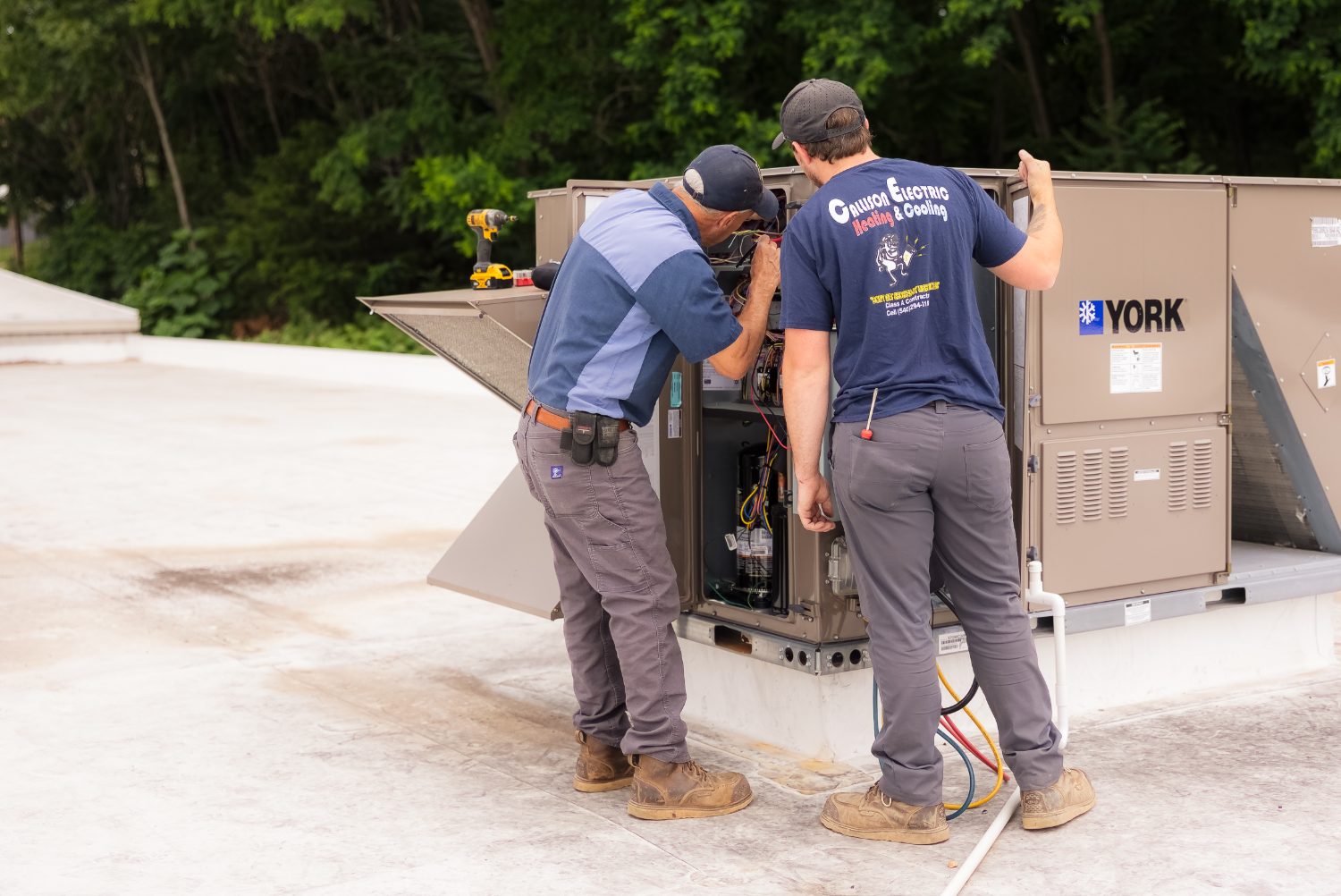 Callison technicians servicing a commercial rooftop York HVAC unit in Staunton, Virginia
